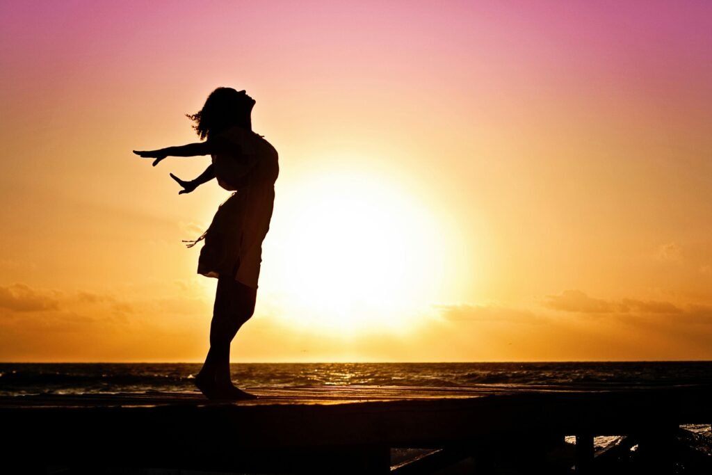 Lady in Beach Silhouette during Daytime Photography